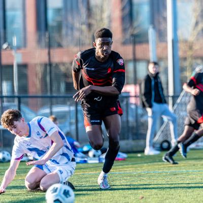 Staffs forward makes a getaway from Coventrys fallen defender