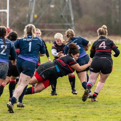 Staffs make a strong tackle against Birminghams running player